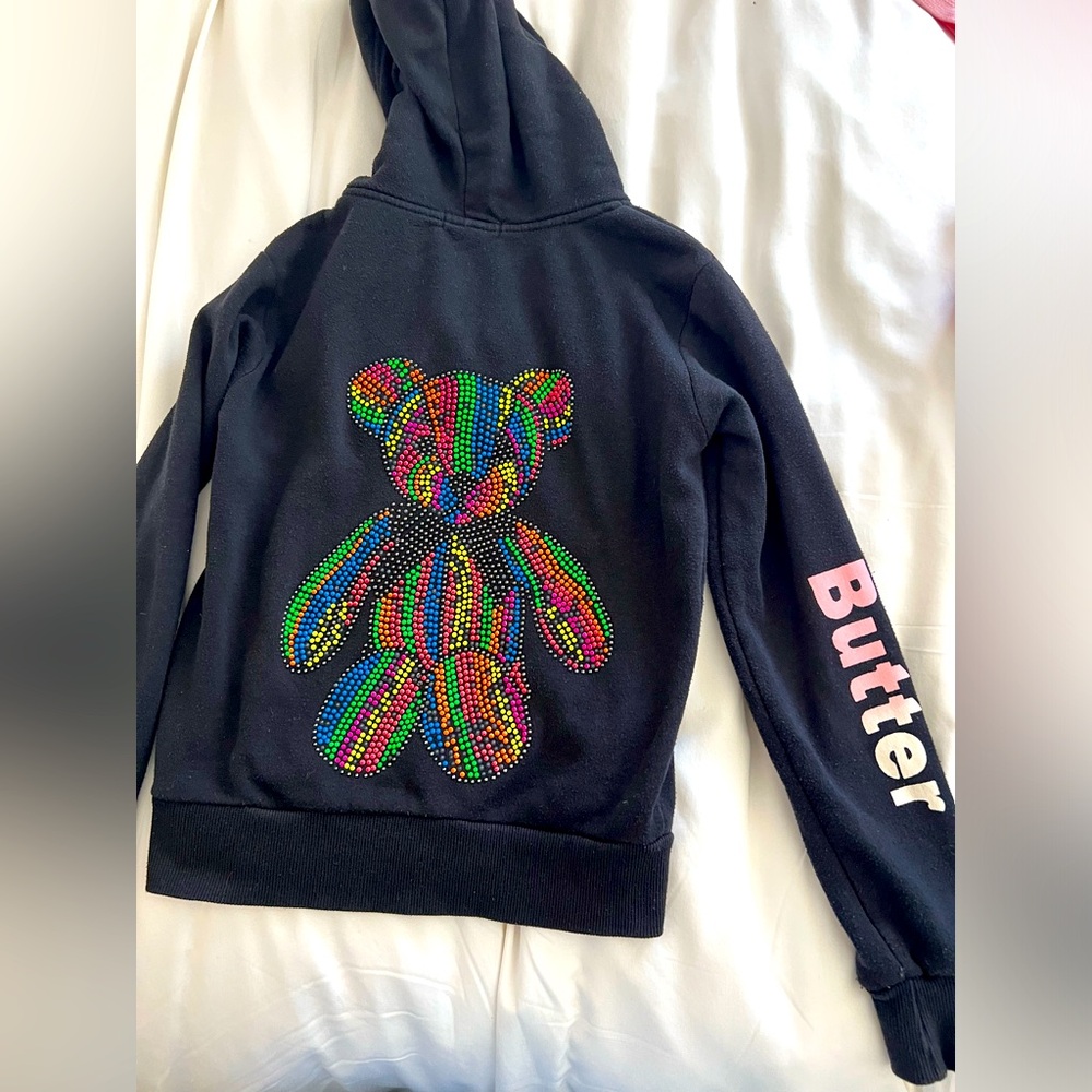 Girls butter sweater with adorable bear design on the back